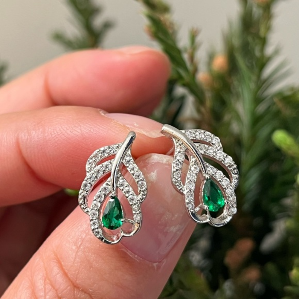 Sparkling silver plated zirconia leaf ear studs